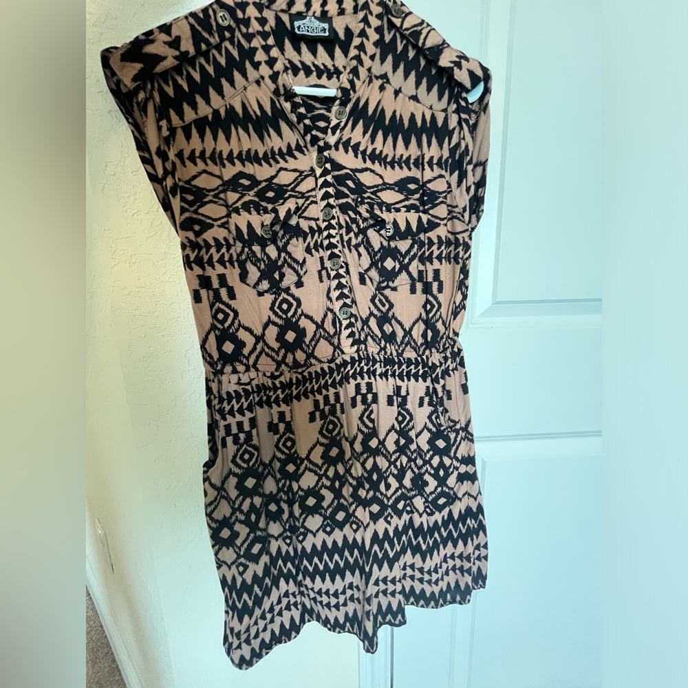 Slightly used half button up beautiful patterned summer dress size s for women.